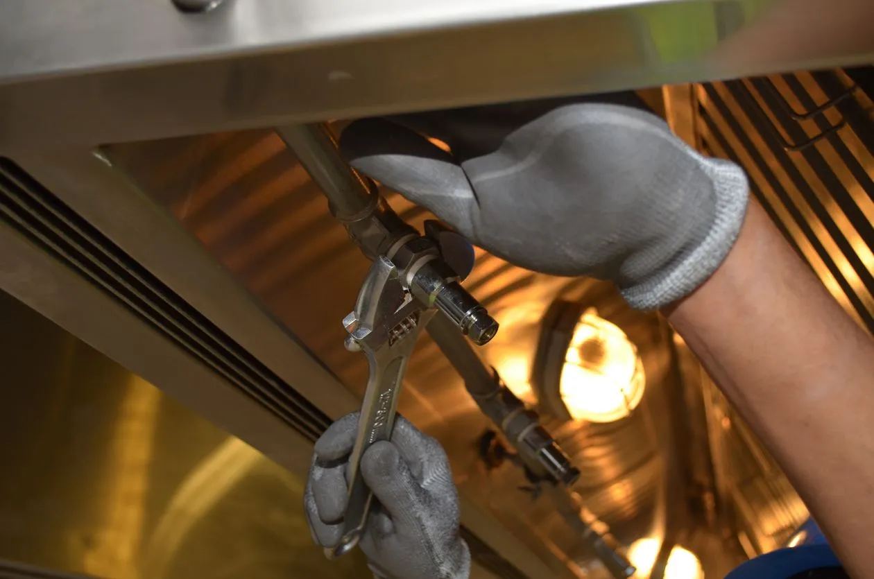 Residential plumber repairing pipes and fixtures